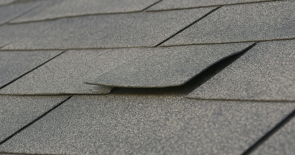 Damaged shingles are a huge roof repair sign